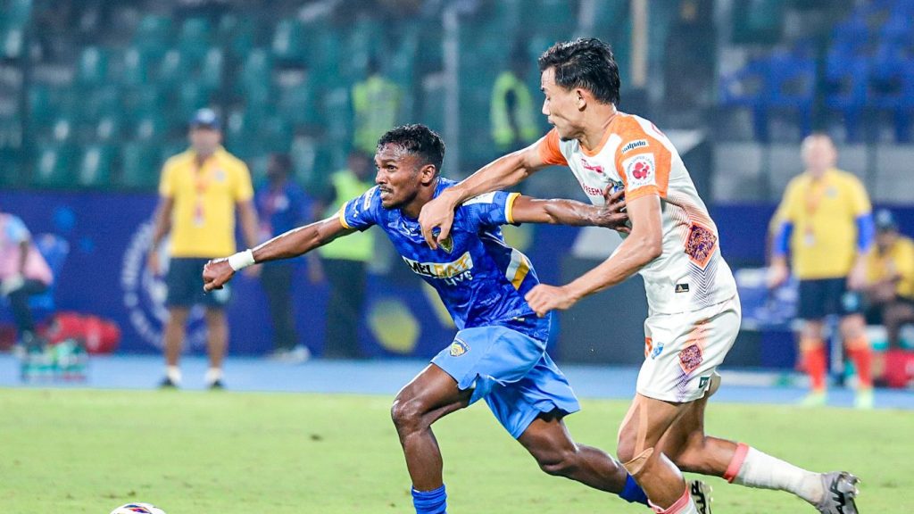 Chennaiyin FC forward Vincy Barretto in action against Naocha Singh.