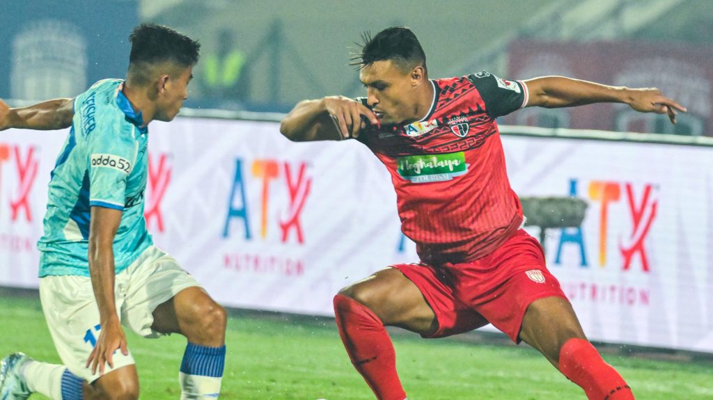 FC Goa defender Boris Singh and Northeast United FC winger Alaeddine Ajaraie in action