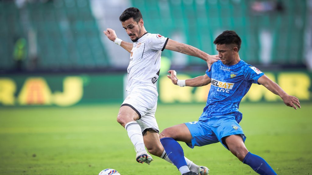 Chennaiyin FC midfielder Hnamte and Punjab FC striker Giakoumakis battling for the ball in the middle of the pitch