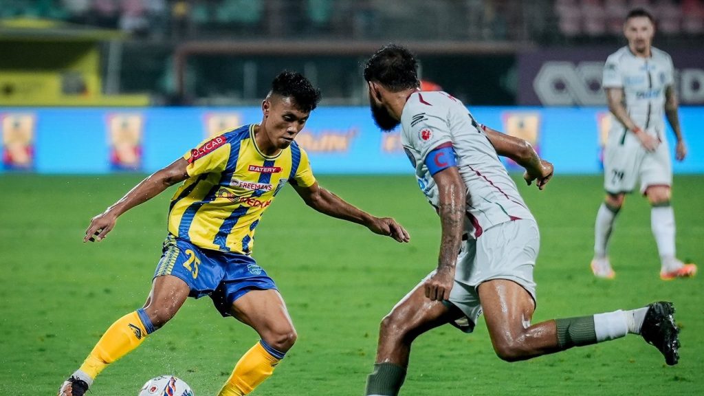 Kerala Blasters youngster Korou Singh in action against Mohun Bagan SG captain Subhasish Bose. 