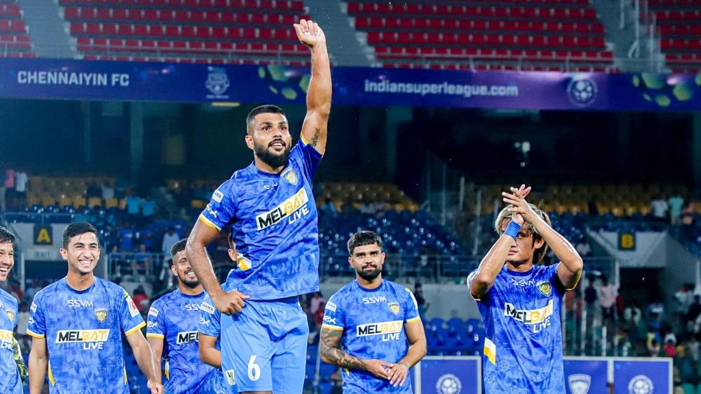 Chennaiyin FC players celebrating their final home game with fans. 