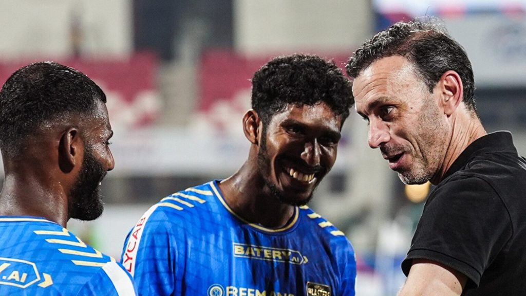Kerala Blasters head coach David Catala with youngsters Saheef and Sreekuttan